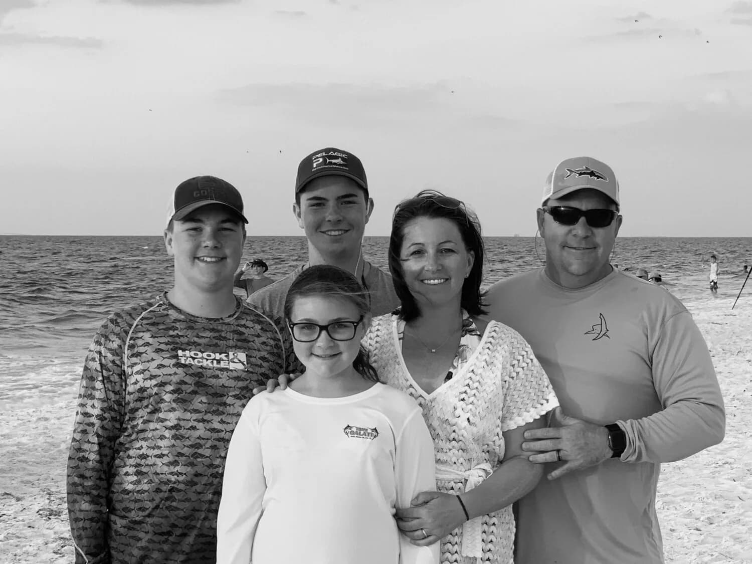 Julie Summers with her husband and three children at the Connecticut shoreline